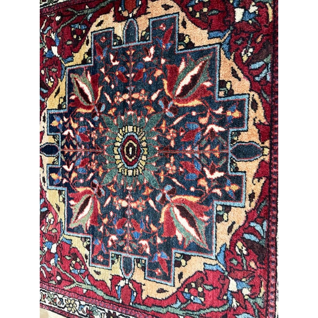 A charming and unusually small antique Feraghan Sarouk rug of fine quality, distinguished by its compact almost-square...
