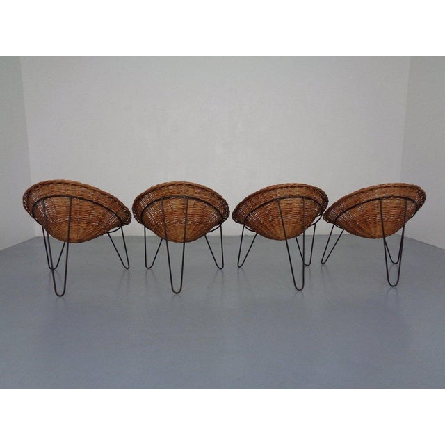 Set of 4 chairs in bamboo, attributed to Janine Abraham & Dirk Jan Rol. Produced in France in the 1950s I have official...