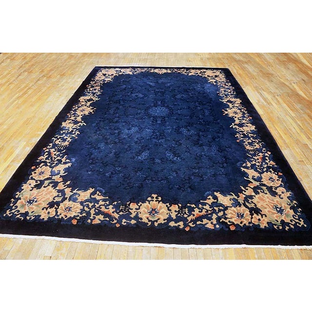 Hand Knotted Pile Rectangle Wool Blue 1920s Antique Rug, Circa Date: 1920s. This exceptional piece of textile artistry...