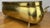 A beautifully crafted Vintage brass plant pot with an elegant elongated jardiniere shape, decorative side handles, and...