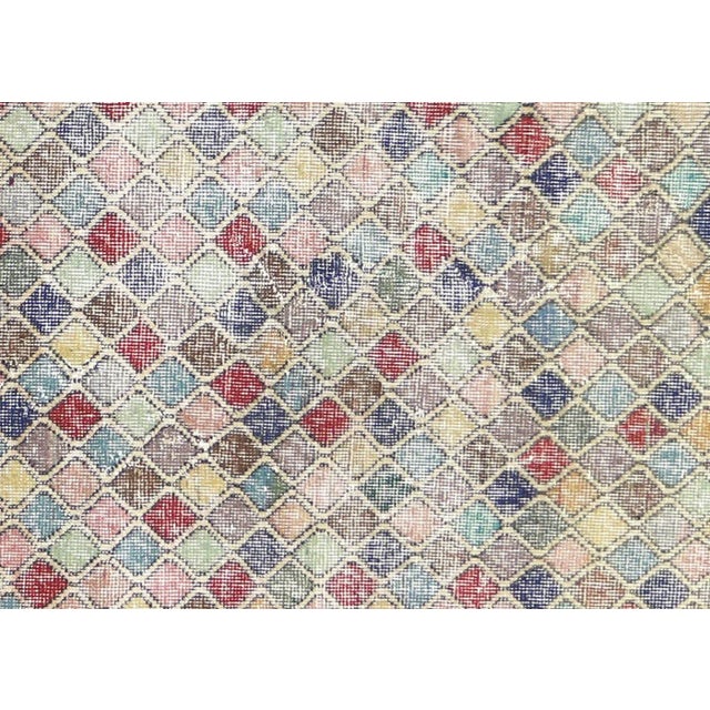 This vintage Turkish mid-century modern rug is handwoven with wool on a cotton foundation in the Sparta region of Western...