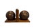 A charming pair of custom lawn bowl bookends. Each features a monogrammed, central disc and numbered “3” and “4”. Each...