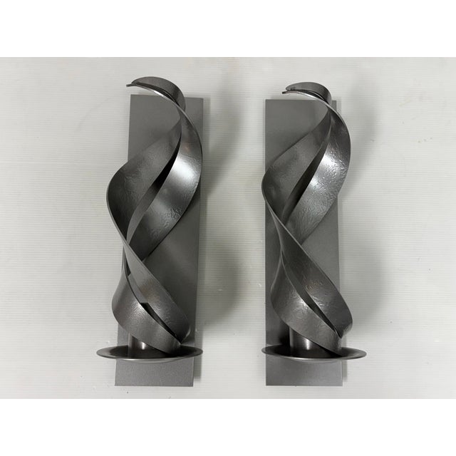 Design Plus Gallery presents a Pair of Folio Wall Sconces from Hubbardton Forge. The two wall sconces are a blend of...