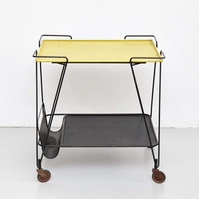 Trolley designed by Mathieu Matégot. Manufactured by Ateliers Matégot (France), circa 1950. Folded, perforated metal...