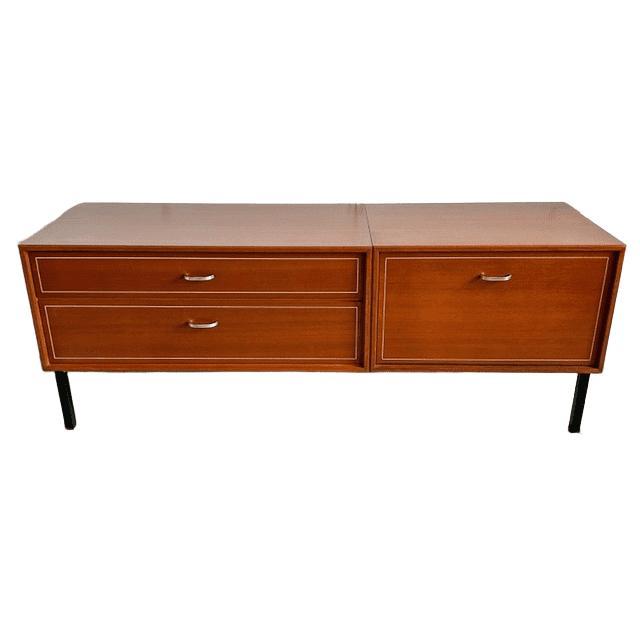 This vintage Danish-design lowboard/TV cabinet from the 1960s has a chic, playful look thanks to its beautiful glossy...