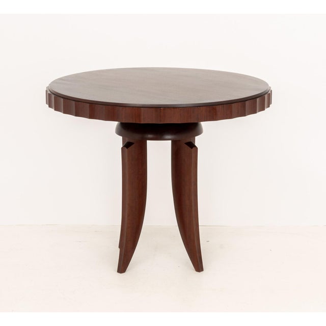 James Schriber Woodworking Studio Furniture Art Deco Style Rosewood Center Table, 1983, with fluted edge upon sculptural...