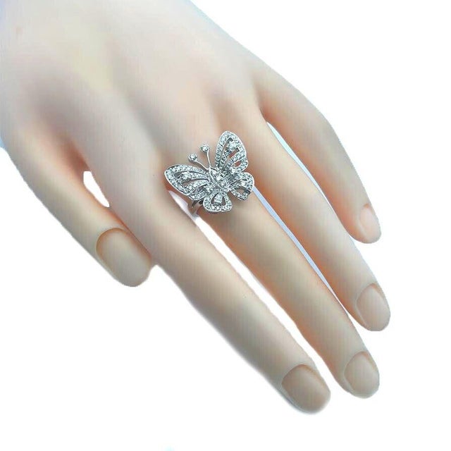 This is an adorable ring from designer Sonia B, it is crafted from 14k white gold featuring an open style winged butterfly...