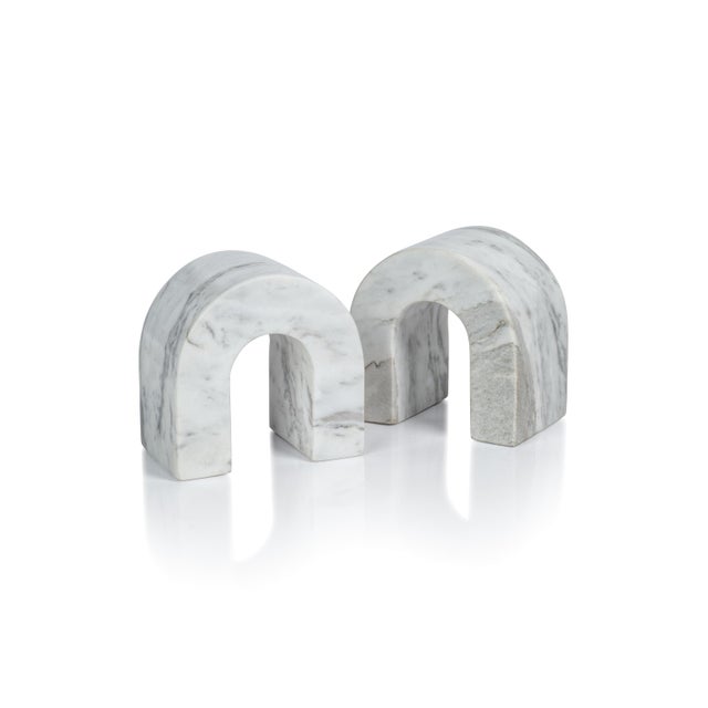 Enhance the allure of your bookcase or tabletop with our set of two u-shaped bookends. Meticulously crafted from exquisite...