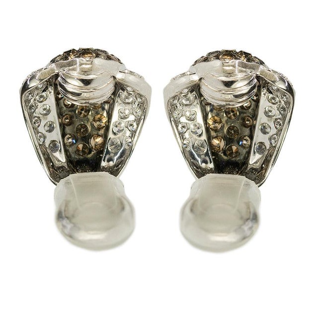 Platinum Earrings with 4.20 carats of champagne round diamonds and 1.68 carats of white round diamonds. French hallmarks....