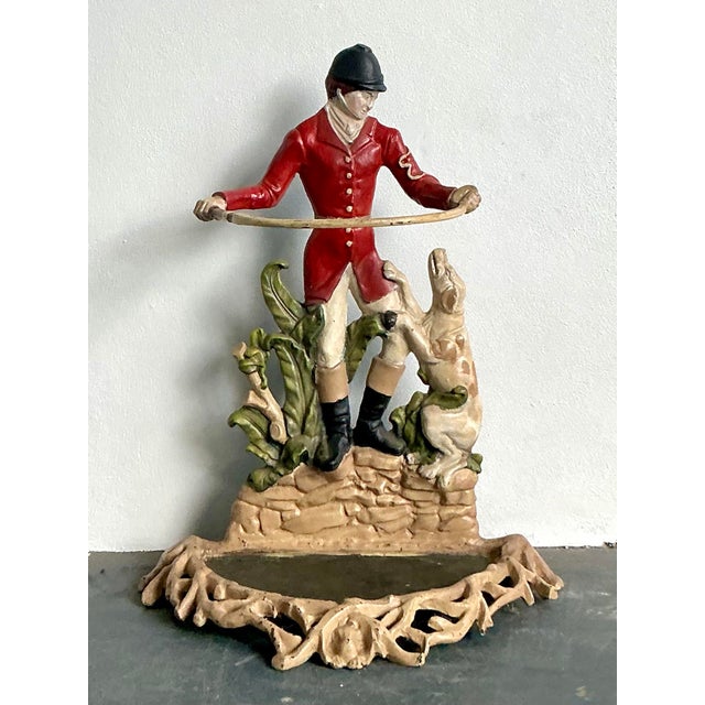 Welcome guests with the distinguished charm of the English countryside using this delightful vintage cast iron umbrella...