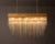 A striking statement piece from RH, the Cascada Rectangular Chandelier by Timothy Oulton features hundreds of individually...