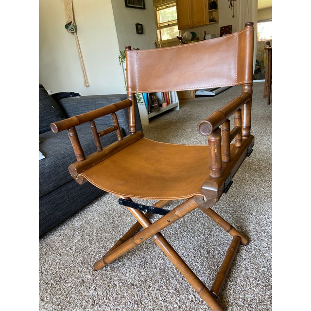 A pair of vintage Telescope leather and bamboo director chairs in beautiful condition.