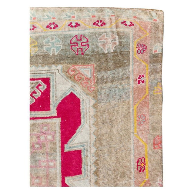 A vintage Turkish Anatolian gallery carpet handmade during the mid-20th century. Measures: 5' 3" x 11' 4".
