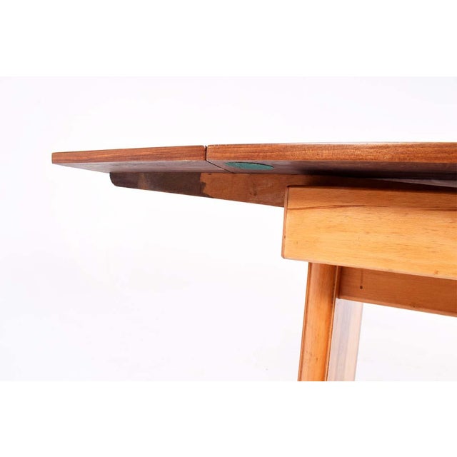 Small extendable art deco dining table in walnut veneer. with two extensions on the side edges of the table. Excellent for...