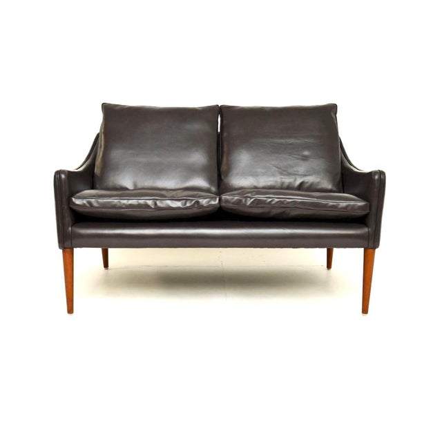 A stunning vintage Danish model 800 leather sofa by Hans Olsen, designed in 1958 for CS Mobler. This was made in Denmark,...