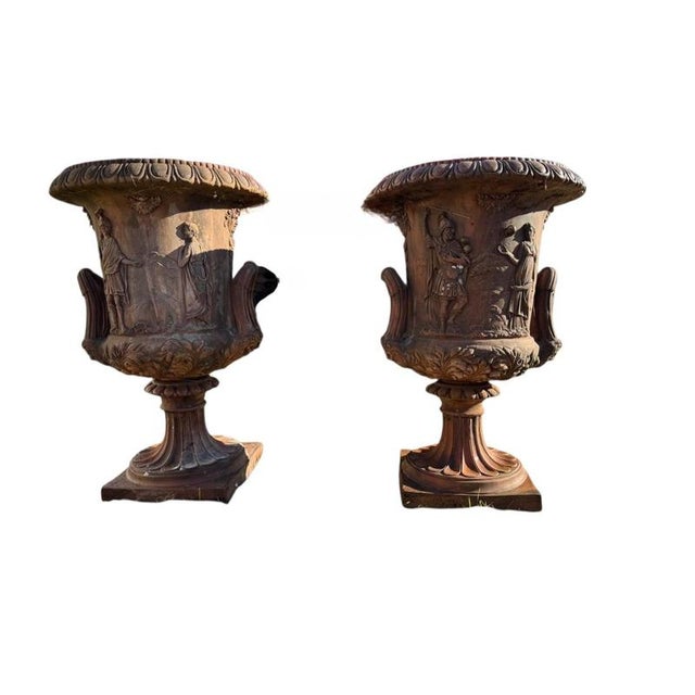 Elegant pair of large Medici-style urns, handcrafted in Impruneta terracotta, a traditional and highly durable clay from...