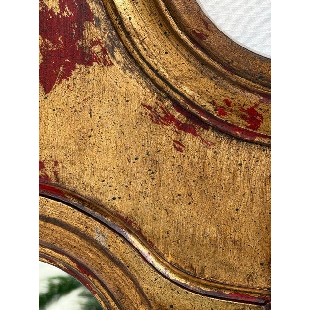 Vintage Mid-Century Red Hand-Gilt Chippendale Wall Mirror Inspired by Tony Duquette Step into the elegance of a bygone era...