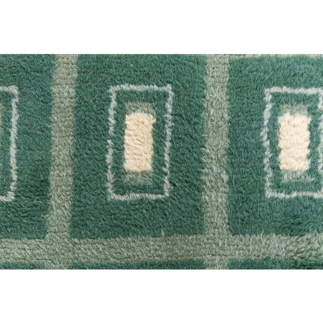 An exceptional vintage French Art Deco carpet, circa 1920s, designed by Paule Leleu, daughter of renowned French designer...