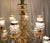 Metal 1970s 12 Light Hollywood Regency Crystal Waterfall Chandelier For Sale - Image 7 of 13