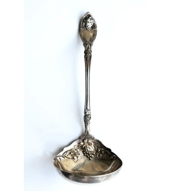 Offered is a 1920s Silver-plate Ladle from the Wm. A. Rogers company, later known as Oneida. It is marked A1, the grade of...