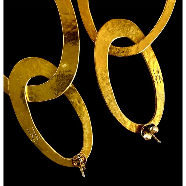 softly hammered stacked gold plated circles are the ideal complement to embellished evening gowns or patterned sundresses....
