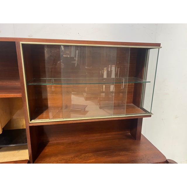 Art Deco architect's buffet in walnut veneer The lower section has two doors and two central drawers The upper section...