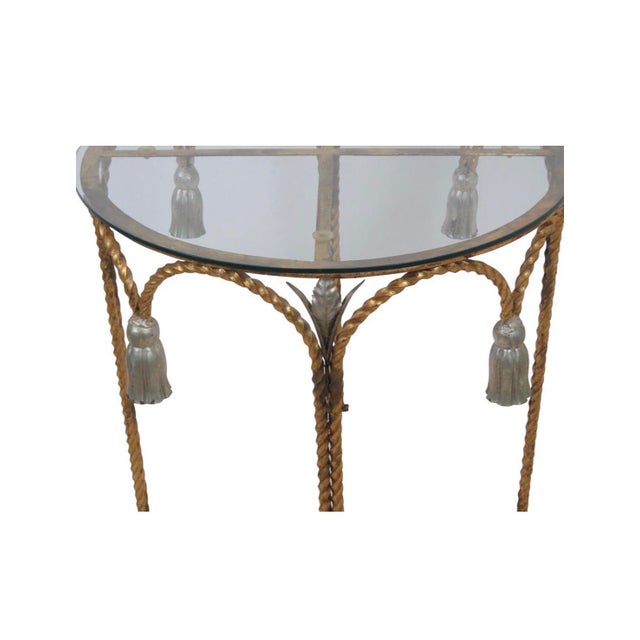 Vintage Italian Hollywood Regency Style Side Table Metal glass top table with tassel and leaf design. 22"d, 22"h Feel free...