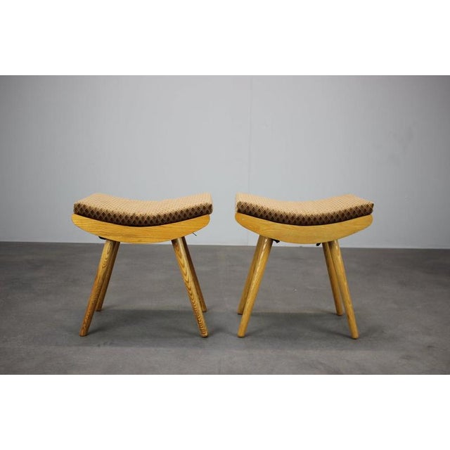 A rare pair of vintage footstools manufactured by Jitona in Czechoslovakia in 1979, showcasing the understated elegance of...
