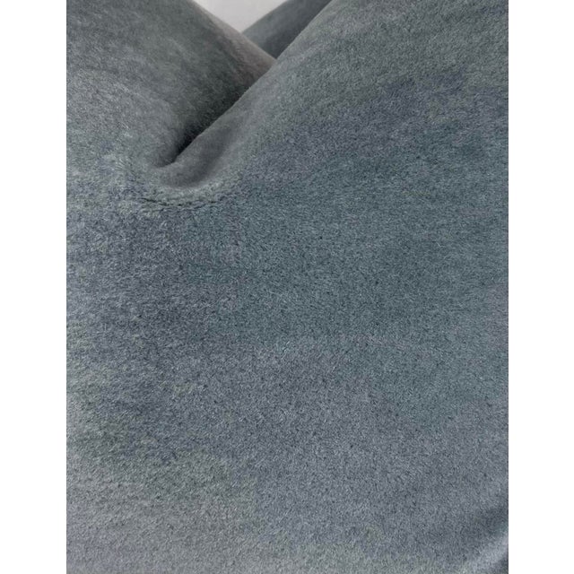 Custom pair of 22" pillows covered in a plush, teddy mohair in blue. These pillows have tapered corners to prevent dog...