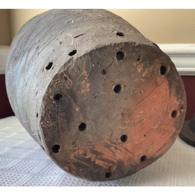 This rare 19th-century burial urn originates from the Ryukyu Kingdom and showcases the distinctive craftsmanship of...