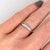 Five earth-mined diamonds run across this solid 14K white gold band. The hardest natural material, diamond has symbolised...