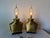 Elegant pair of vintage Chapman table lamps from 1976 featuring an intricate brass basketweave design with strong...