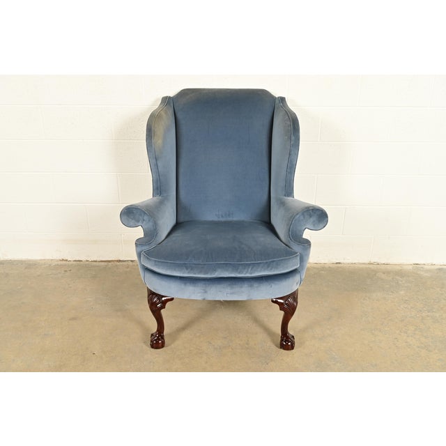A gorgeous Chippendale or Georgian style wingback library chair, lounge chair, or fireside chair By Kindel Furniture USA,...