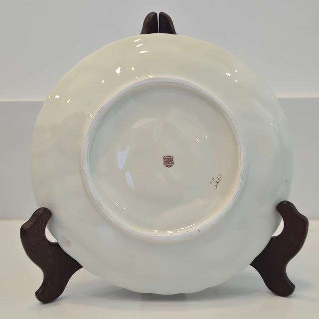 Elevate your collection or gallery wall with this exquisite antique late 19th-century German porcelain oyster plate,...