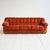 Upholstered three-seater sofa with rust-colored velvet upholstery, featuring quilted workmanship and tubular steel...