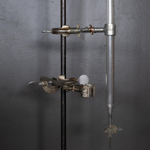 ABOUT Transform your space with this antique Fisher Laboratories stand—a piece that seamlessly bridges scientific heritage...