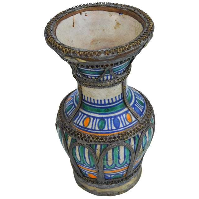 Antique handcrafted and glazed polychrome ceramic vase. Features an intricate hand-painted Moorish pattern adorned with...