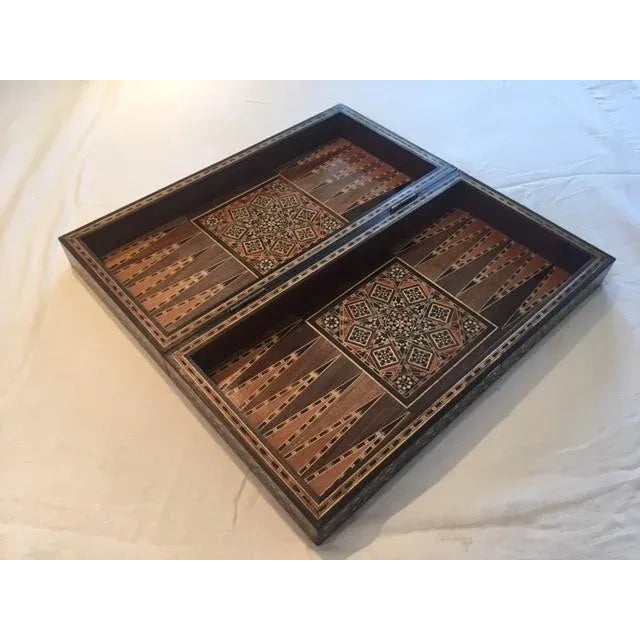 Large vintage mid-century inlaid mosaic backgammon and chess game with Moorish motif designs. The chess and checker board...