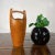 Model 810 Congo ice bucket by Jens Quistgaard for Dansk. The solid teak, Danish made ice bucket was designed in 1958....