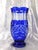 This is a blue cut to clear vase. I have two of them, but they are not exactly the same. This one has a shallow scalloped...