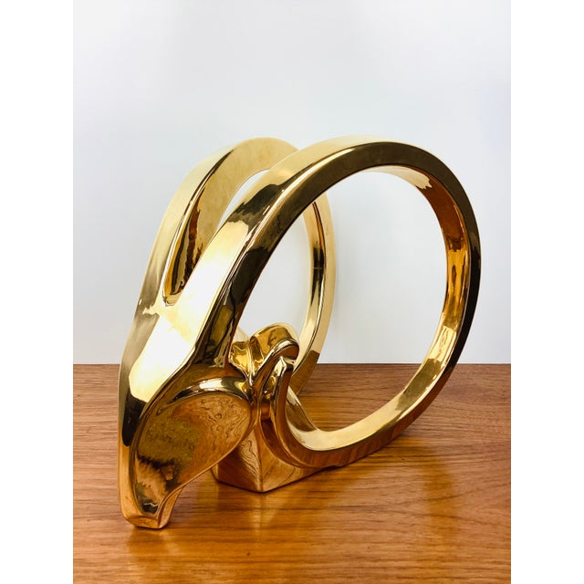 Vintage Stylized Rams Head Statue by Jaru made of a ceramic material gold metallic mirror like surface stylized ram head...