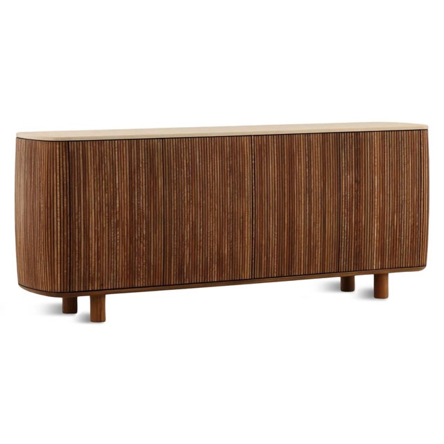 Rich warm teak wood sideboard blending organic modern design with refined architectural detailing. Features slatted...
