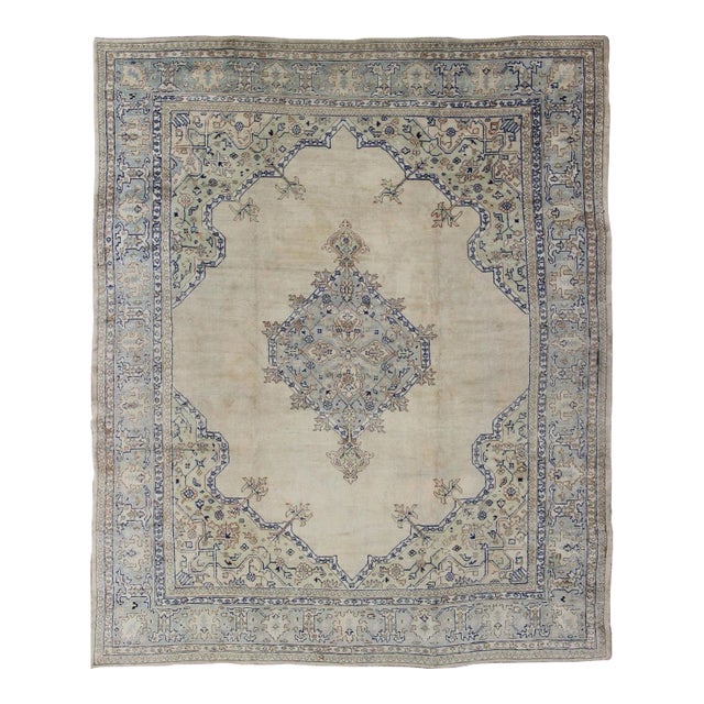 Early 20th Century Antique Turkish Oushak With Geometric Motifs in Champagne Field and Accent Blue For Sale