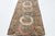 This striking pair of vintage American hooked rugs showcases a bold and visually engaging overlapping rings motif that...