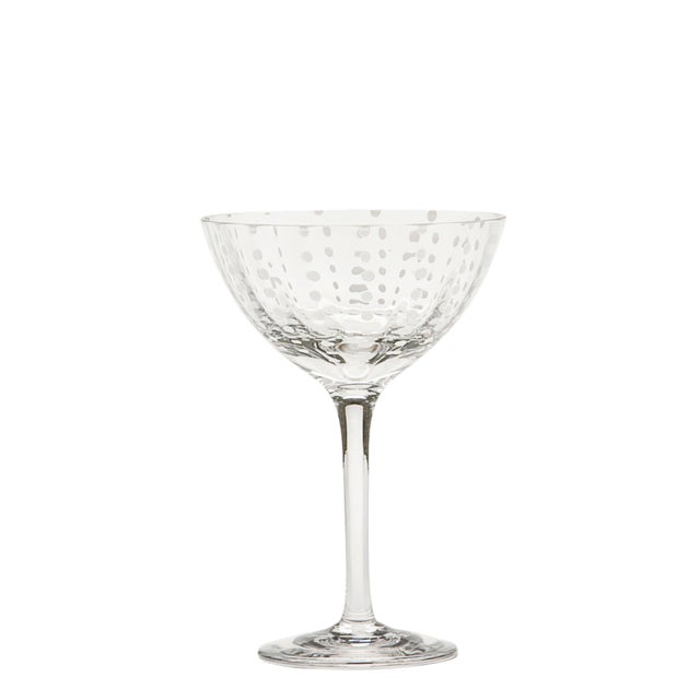 Collection for the table in clear colored glass. It includes tumblers for water and soft drinks, wine glasses, flute...