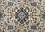 A wonderful late 20th century Persian Kashan rug with an elaborate all-over pattern woven with myriad large and small...