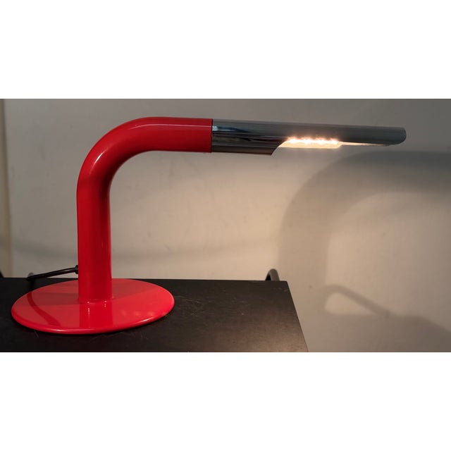 A stunning mid-century modern lamp that makes a real statement with its combination of chrome and fiery red. the gulp lamp...