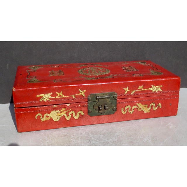 Chinese Leather storage box with auspicious symbols of longevity and happiness. A double image with bats in the borders...