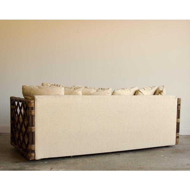 Vintage Rattan Trellis Lattice Sofa in the Style of McGuire With Casters, Wrapped Joints, and Ivory Upholstery, 1970s For Sale In Salt Lake City - Image 6 of 9