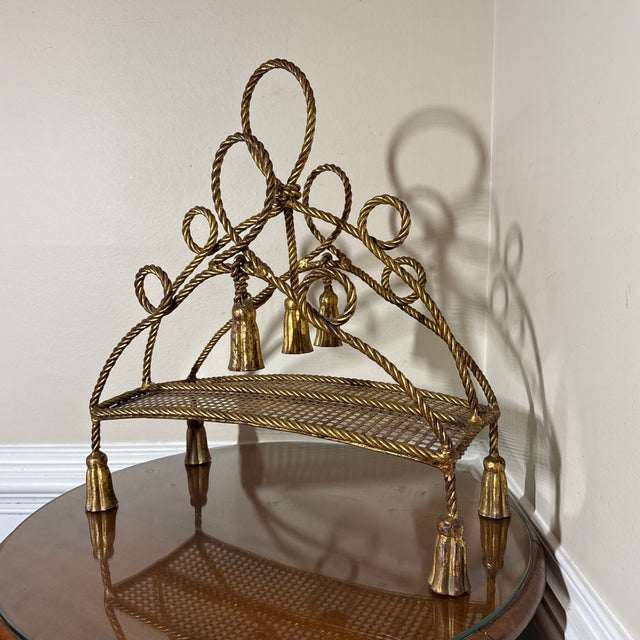 Italian Mid-Century Gilded Rope Tassels Magazine Book Rack. Gilt rope with tassels magazine/book rack holder from the mid...